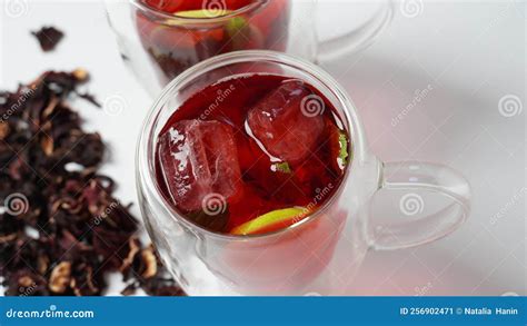 Hibiscus Cold Tea Drink With Ice Cubes And Lemon In Glass Stock Image