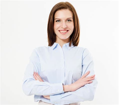 Smiling Brunette Woman In Shirt Standing With Crossed Arms Isolated