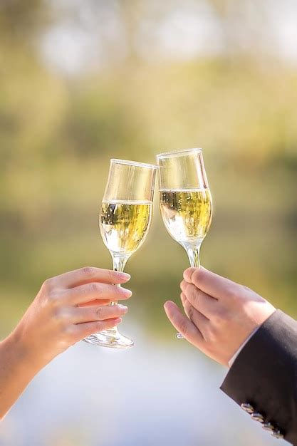 Premium Photo Close Up Of Hand Holding Glass Of Wine