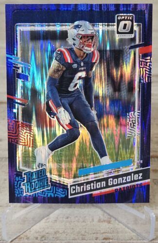 Christian Gonzalez 2023 Panini Donruss Optic 274 Purple Shock Prizm RC