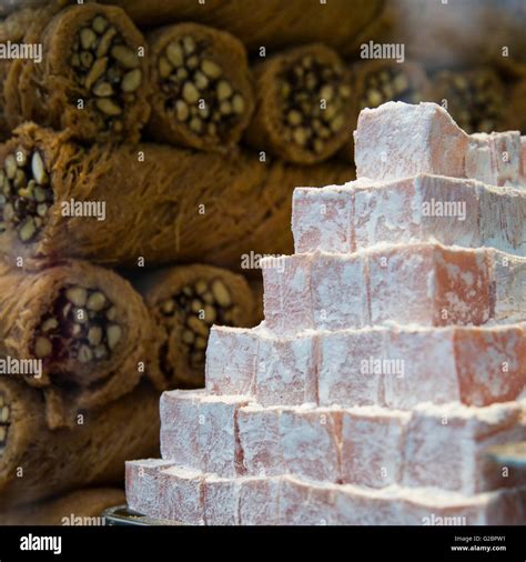 Pyramid Of Turkish Delight And Stack Of Pistachio Pastries In A Shop