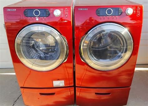 Red Samsung Front Load Washer And Electric Dryer With Pedestals For Sale