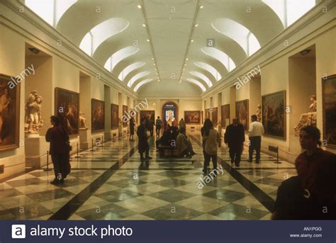 Prado Museum Madrid With Visitors Looking At Paintings Stock Photo