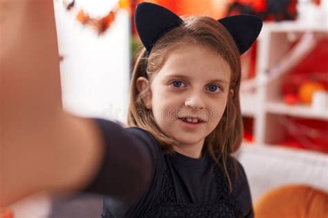 Adorable Blonde Girl Wearing Halloween Costume Make Selfie By Camera At Home Stock Photo Image