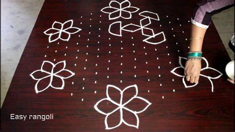 Flower Kolam Designs With 15x8 Interlaced Dots Chukkala Muggulu