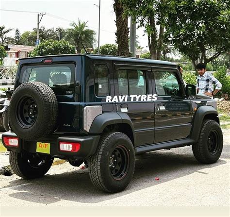 Maruti Suzuki Jimny modified with off-road alloy wheels and all terrain tyres - Car Fix Guru