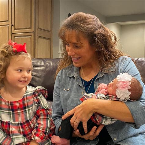 Michelle Duggar Cradles Jingers Newborn Baby Daughter Evangeline As