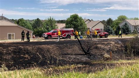 Aurora Fire said a grass fire threatened homes | 9news.com