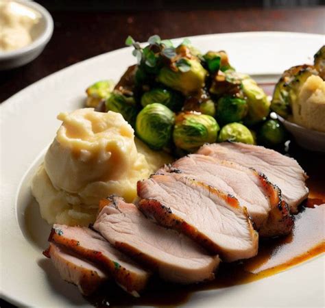 Succulent Pork Loin With Roasted Brussels Sprouts And Creamy Mashed Potatoes Recipe In 2023