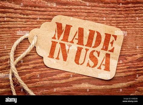 Made In Usa Sign Red Stencil Text On A Paper Price Tag Against Grunge