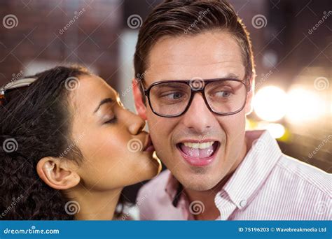 Woman Kissing Man On Cheek Stock Image Image Of Fondness 75196203