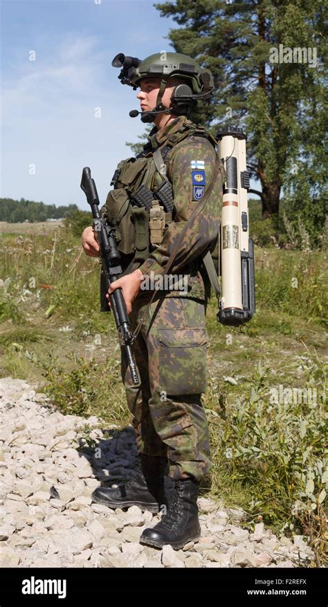 Finnish soldier with modern weapons and fighting equipment, including ...