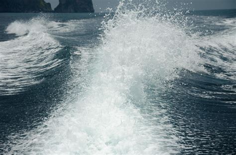 waves sea ship  stock photo  vecteezy