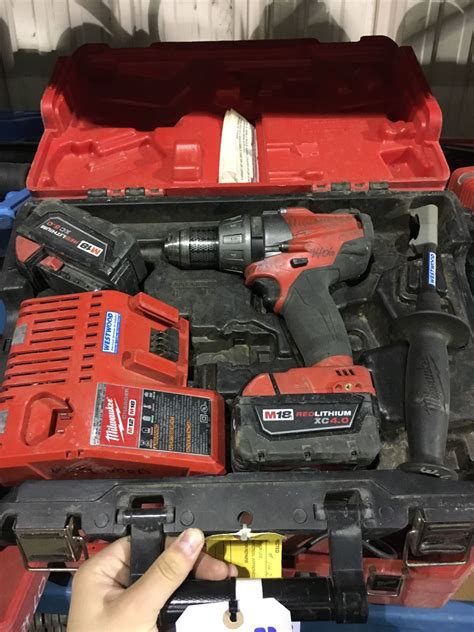 MILWAUKEE M18 CORDLESS DRILL WITH 2 BATTERIES & CHARGER IN CASE