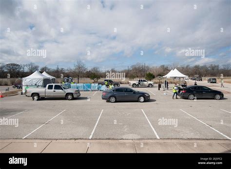 February 21 2021 Vehicles Wait In Line At The Onion Creek Soccer