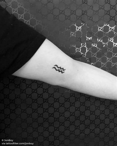 Minimalist Aquarius Zodiac Symbol Tattoo On The Inner Arm Tatuaje De