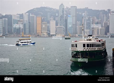 Star Ferry Pulling Out From Tsim Sha Tsui With Hong Kong Skyline And