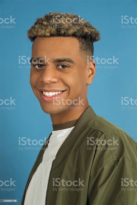 Africanamerican Mans Portrait Isolated On Blue Studio Background Stock