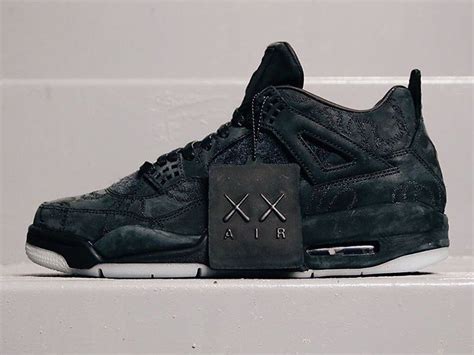 KAWS x Air Jordan 4 “Black” | Sneakers, All black sneakers, Jordan 4 black