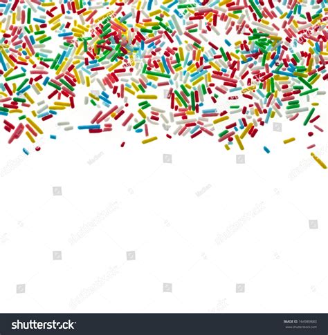 Border Frame Of Colorful Candy Sprinkles Isolated On White Background