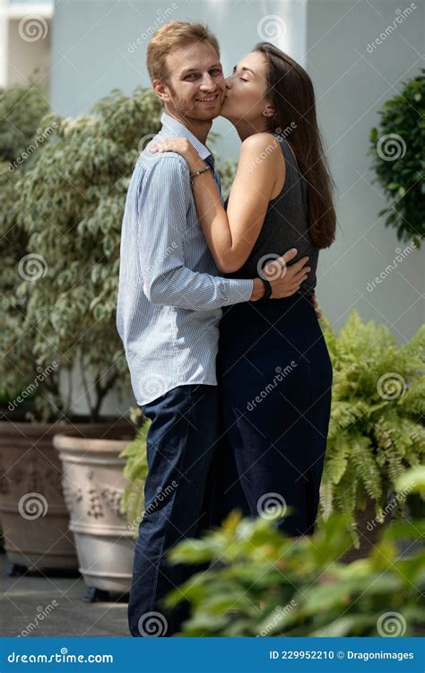 Happy Man Getting Kiss on Cheek Stock Photo - Image of family ...