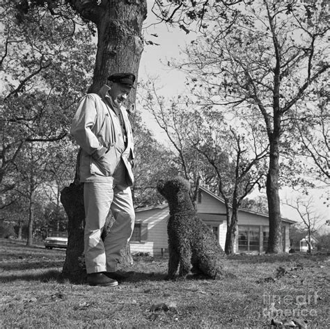 John Steinbeck And Dog Charlie By Bettmann