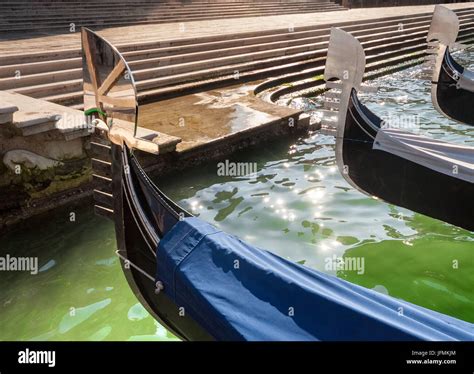 Three Gondolas Moored At The St Marks Square Jetty On The Grand Canal