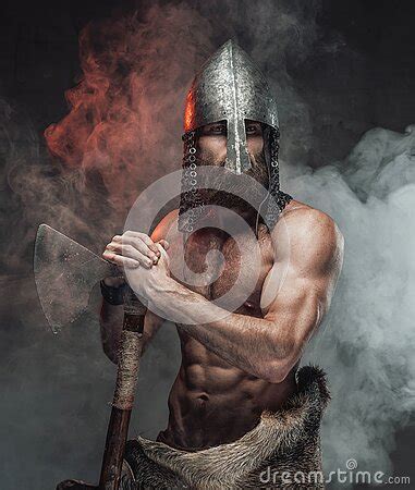 Legendary Viking With Naked Torso In Smoky Background With Axe Stock