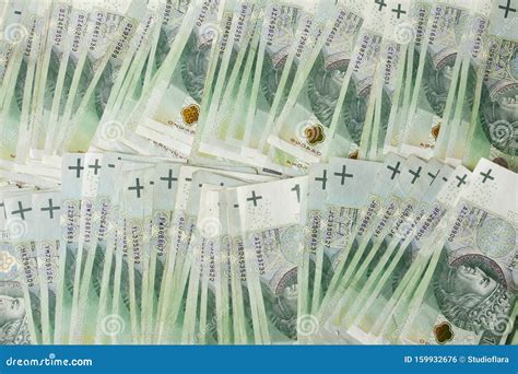 Porciones De Zloty Del Dinero De La Moneda Del Pulimento Foto De