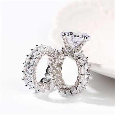 Jeulia Cushion Cut Three Sided Pave Sterling Silver Eternity Ring Set