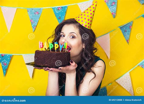 Beautiful Caucasian Girl Blowing Candles On Her Cake Celebration And