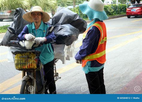 Two Female Sanitation Workers In Conversation Editorial Photography