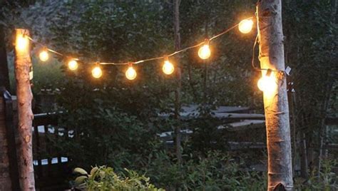 Get This Romantically Rustic DIY Backyard Lighting For Less Than $20