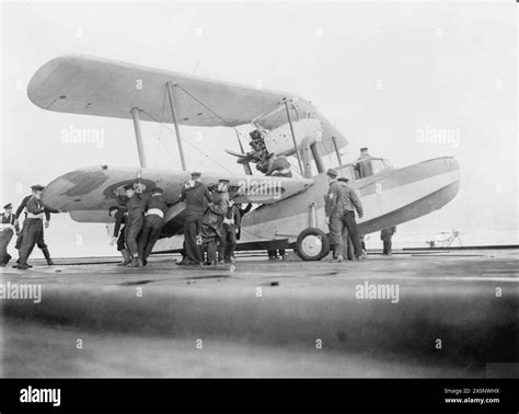 ON BOARD THE AIRCRAFT CARRIER HMS ARGUS. 1940. - A plane comes up from ...