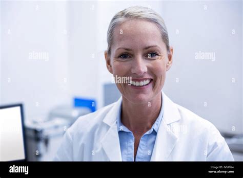 Portrait Of Female Dentist Smiling Stock Photo Alamy