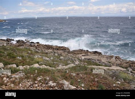 The Sea Wave Crashing On The Rock And Make The Splashing Water And