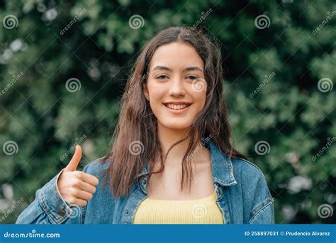 Girl With Phone Smiling Happy With Satisfaction Stock Image Image Of