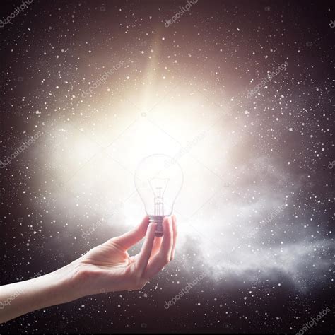 Hand Holding Light Bulb Stock Photo 4masik 61060149