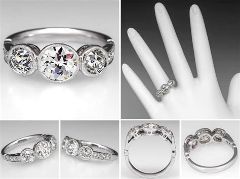 This Stunning Vintage Bezel Set Three Stone Engagement Ring Is Centered