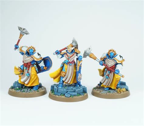 Three Painted Warhammers With Spears And Shields