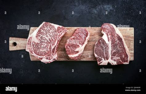 Raw dry aged wagyu porterhouse beef steak Stock Photo - Alamy