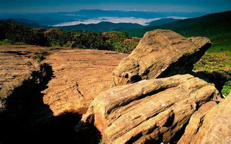 Brown Rock Formation On Field Hd Wallpaper Wallpaper Flare