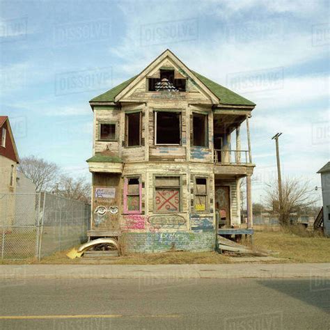 A run-down, abandoned house with graffiti on it, Detroit, Michigan, USA - Stock Photo - Dissolve