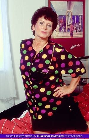 Smoking Hot Granny Takes Off Her Multi Colored Blouse An XXX Dessert