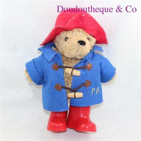 Peluche Ours Paddington Bear Manteau Bleu Chapeau Rouge 24 Cm SOS