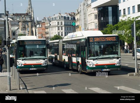 natural gas powered bendy buses in Lille France Stock Photo - Alamy