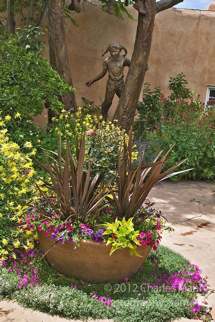 Bronze Sculptures And Colorful Gardens Make Shopping On Canyon Road In