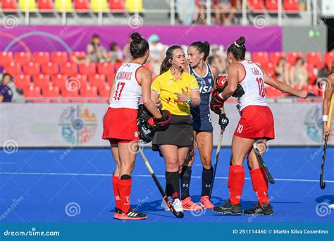 Players In Action In The Argentina Vs Canada Field Hockey Match At The