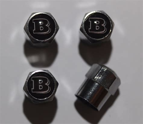 Brabus Black Logo Tire Valve Stem Caps Plus Free Extra Cap