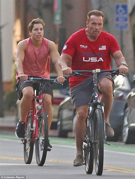 Arnold Schwarzenegger And Son Joseph Baena Take A Bike Ride After Gym